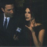 Sandy talking, Ben watching